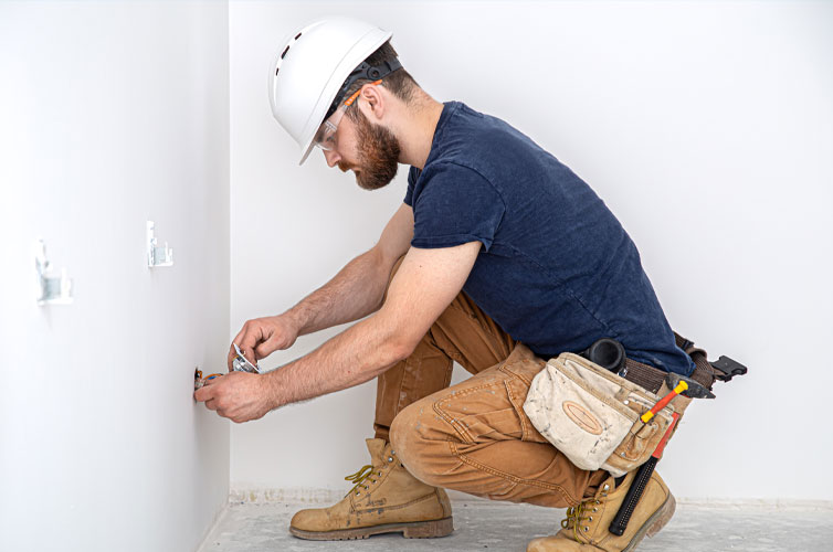 Electrician working in a home